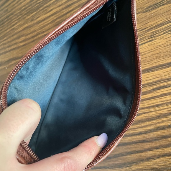 Pre-owned Coach Multi-pattern wristlet. - Picture 7 of 7